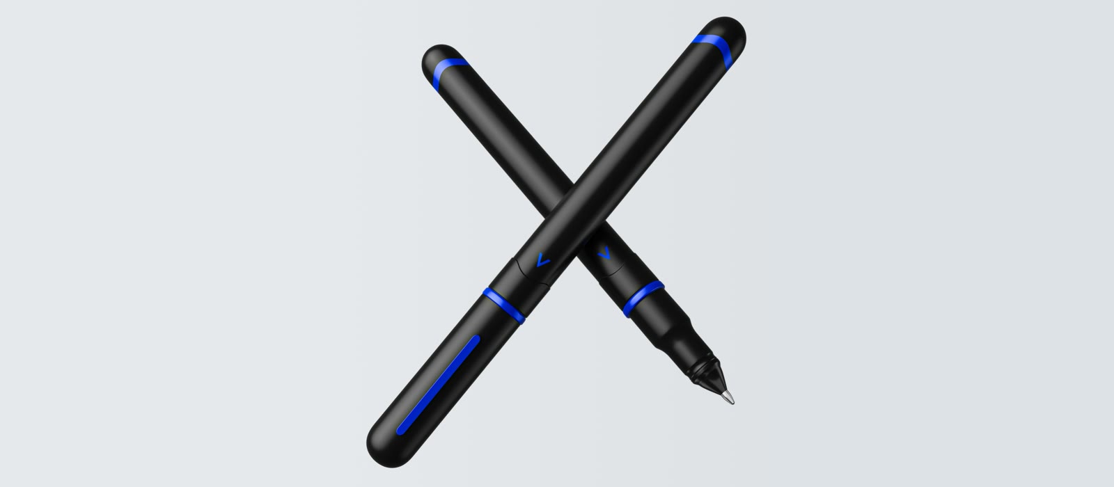 Deux stylos AlphaPen noirs à liserés bleus, croisés