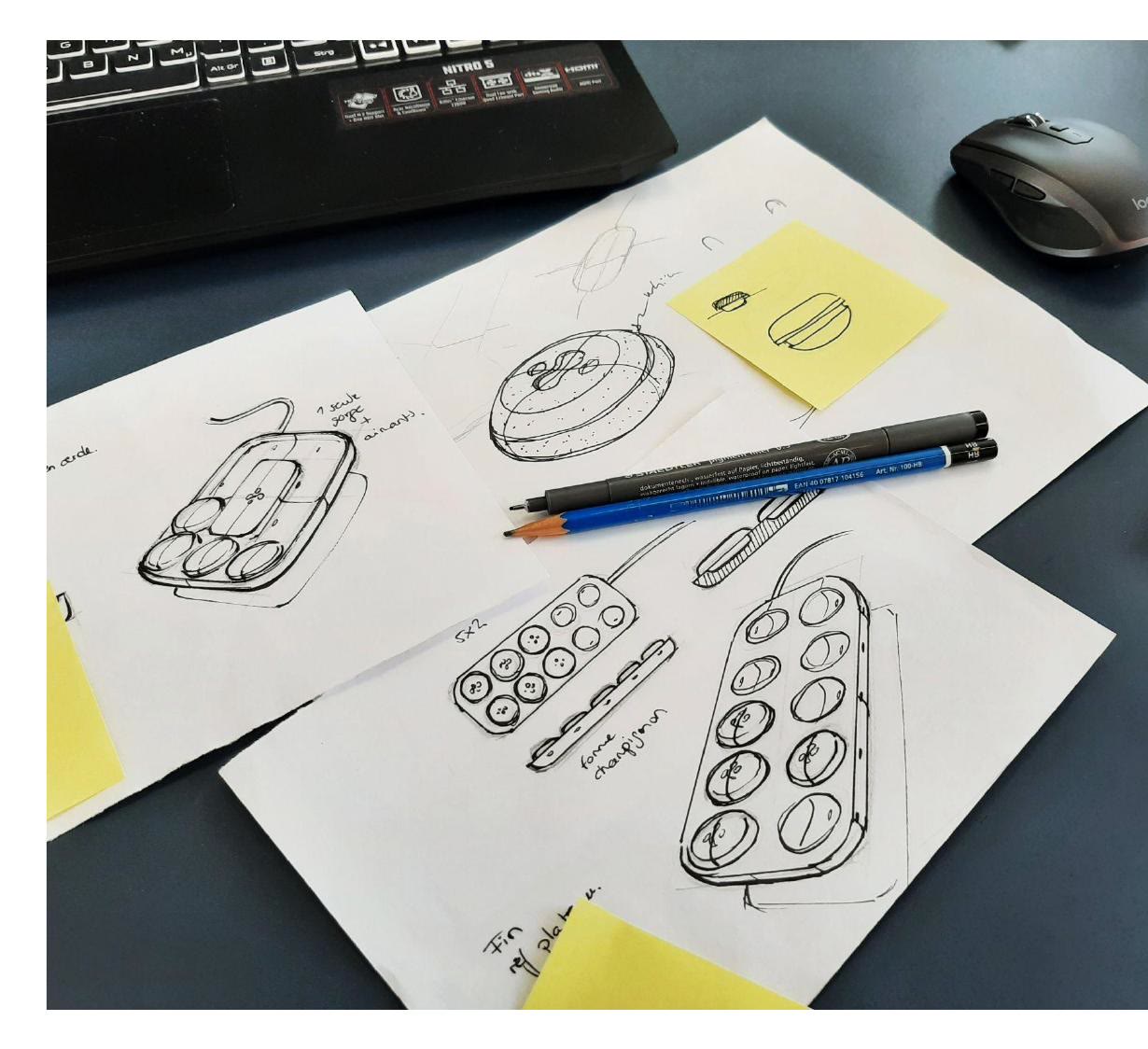 Croquis de la rune et du socle de recharge sur la table de travail